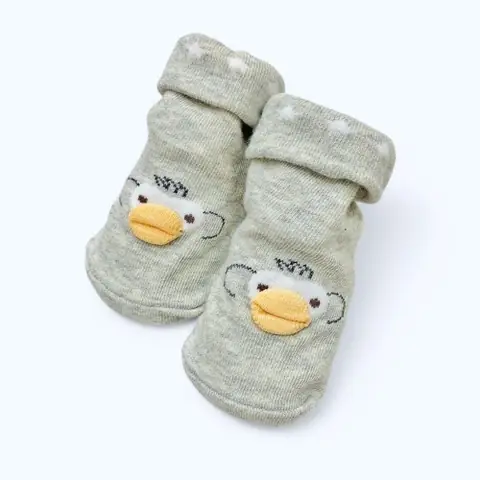 A Baby And A Sock